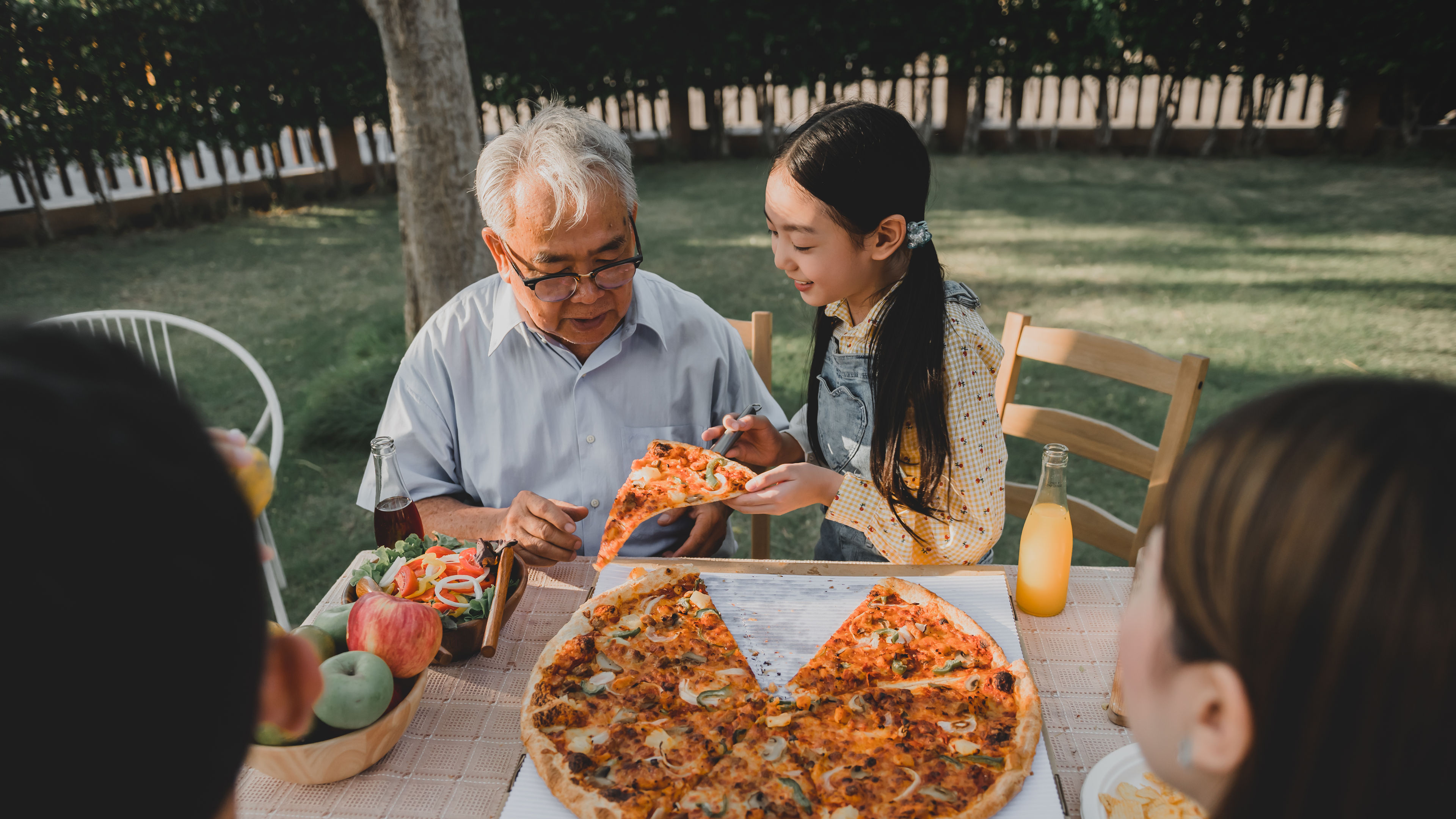 Family enjoying pizza