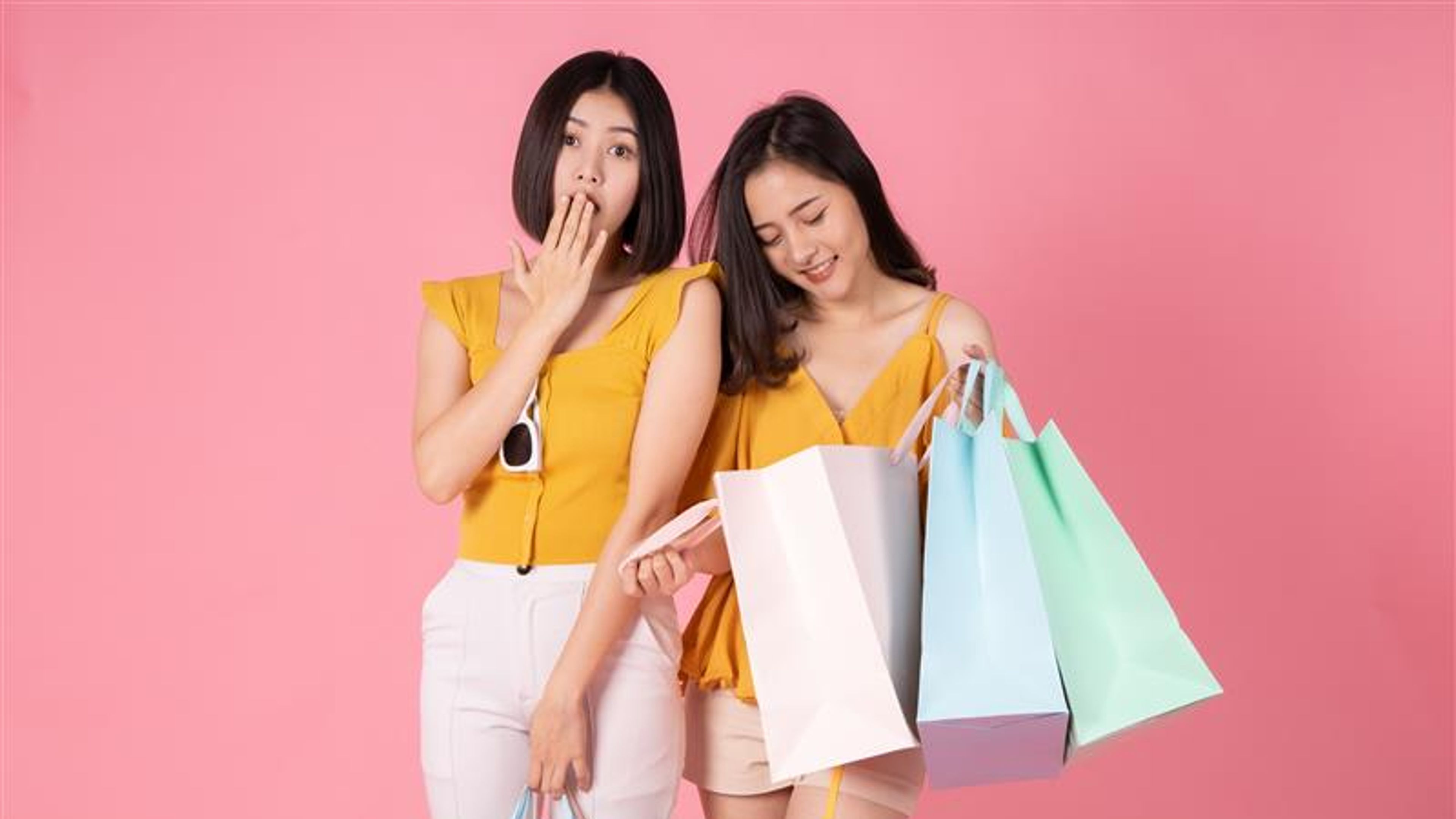 Two Asian happy girls