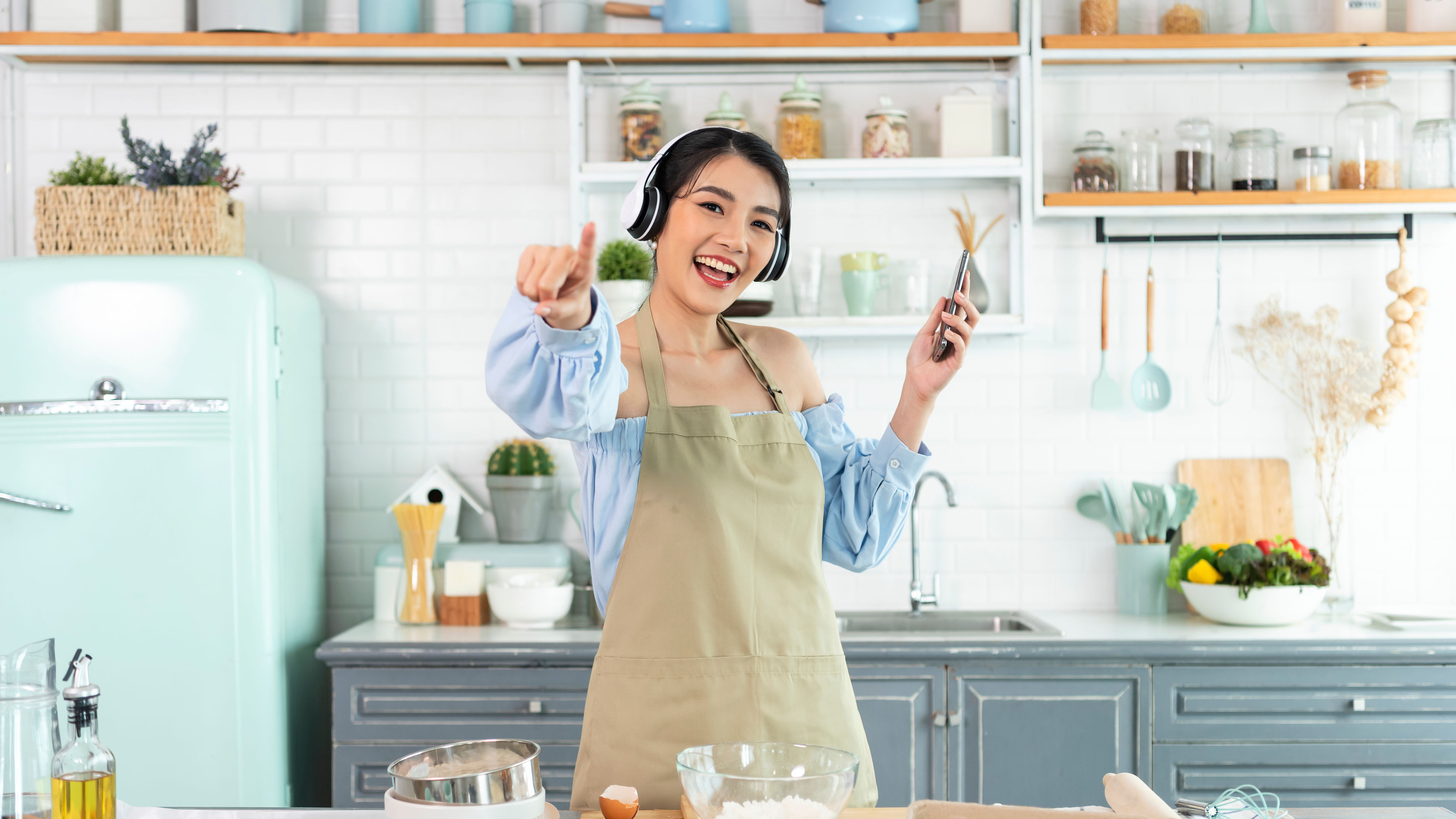 Young Asian woman in kitchen