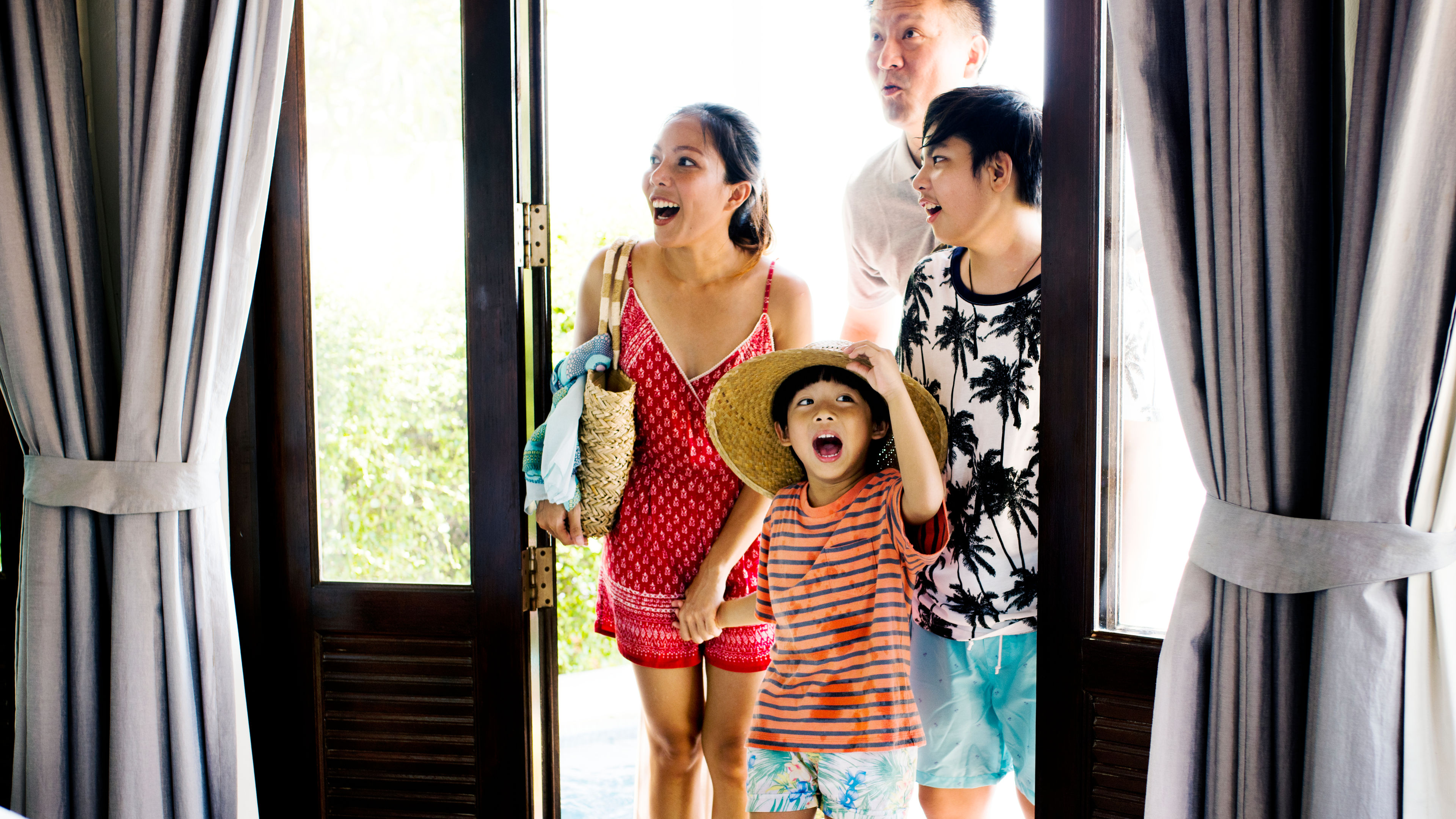 A family of four enjoying their vacation in a resort. 