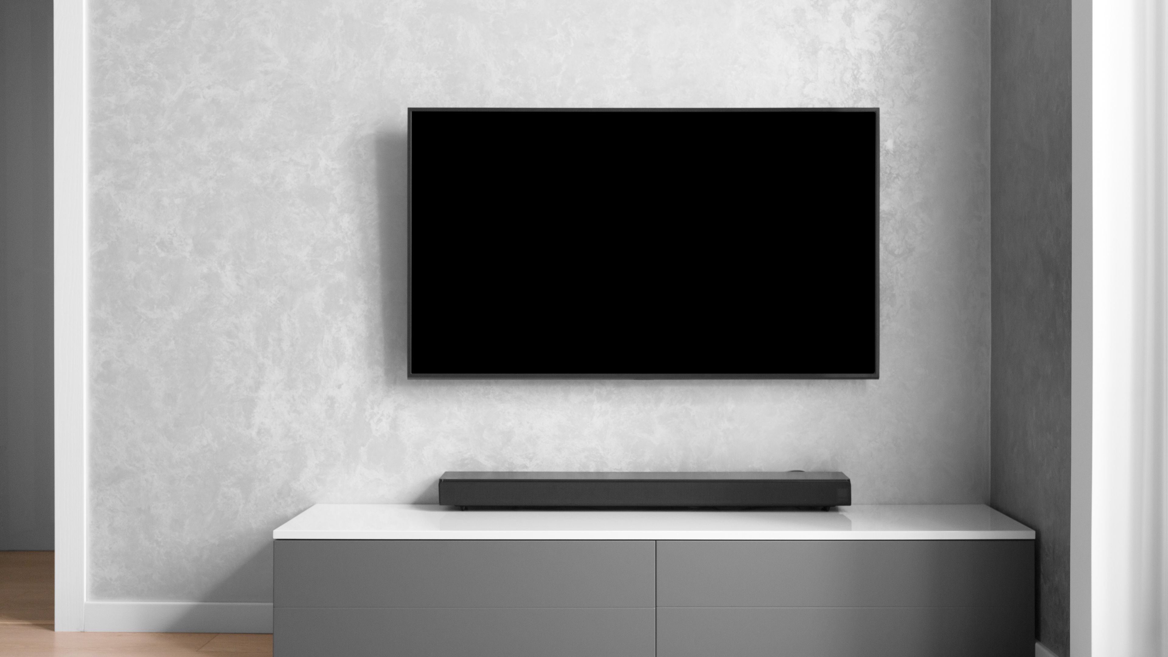 A view of a TV and sound bar 