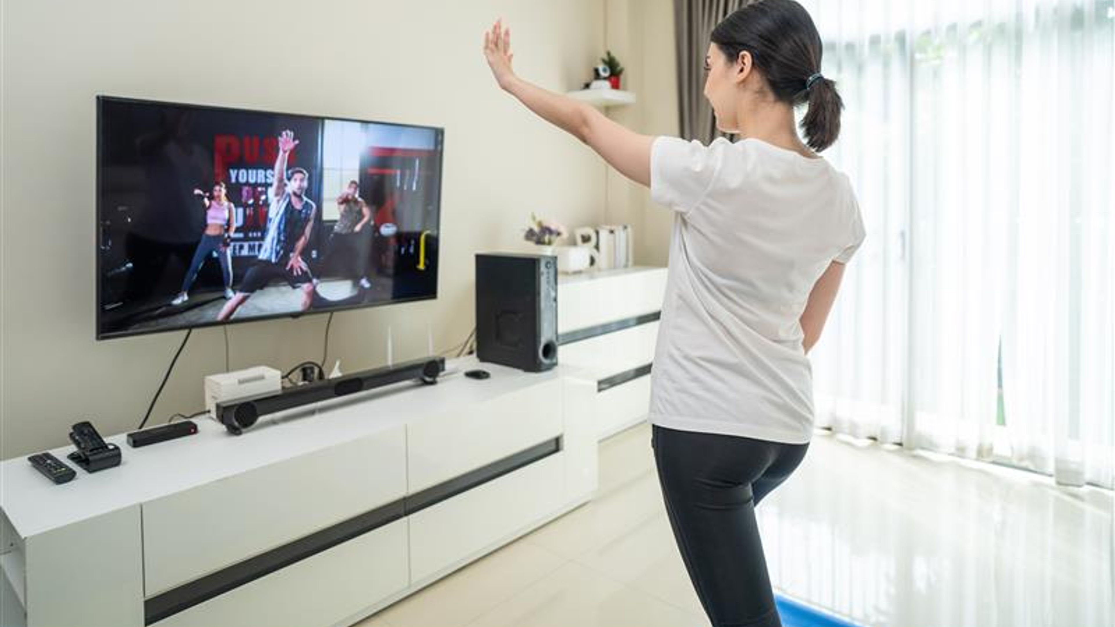 A woman watching TV  