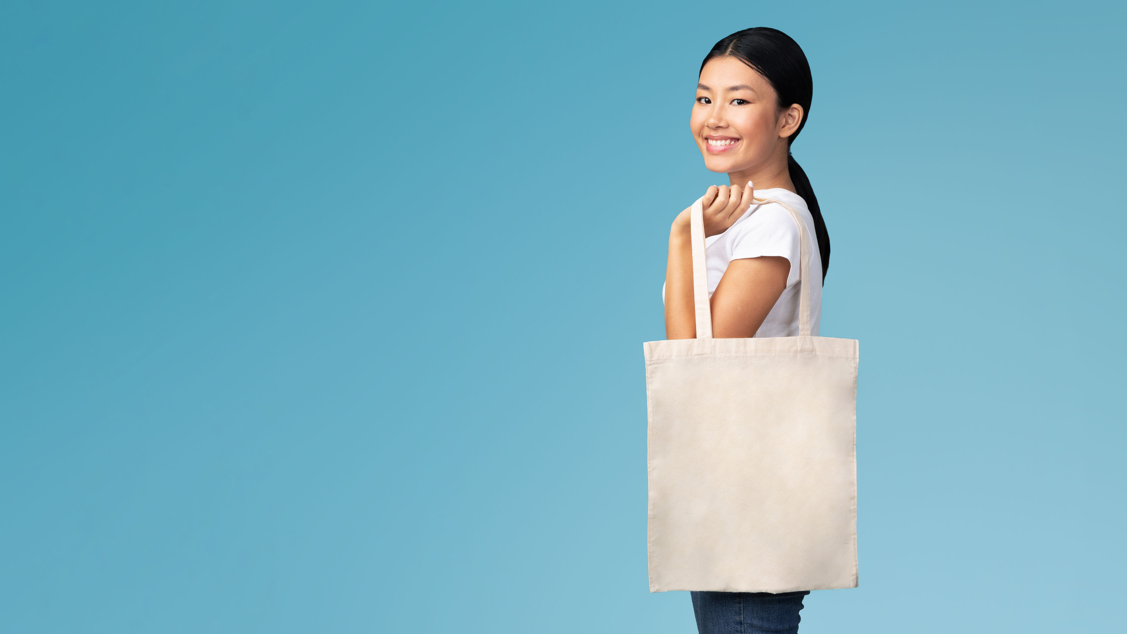 Asian Girl With White Eco Bag