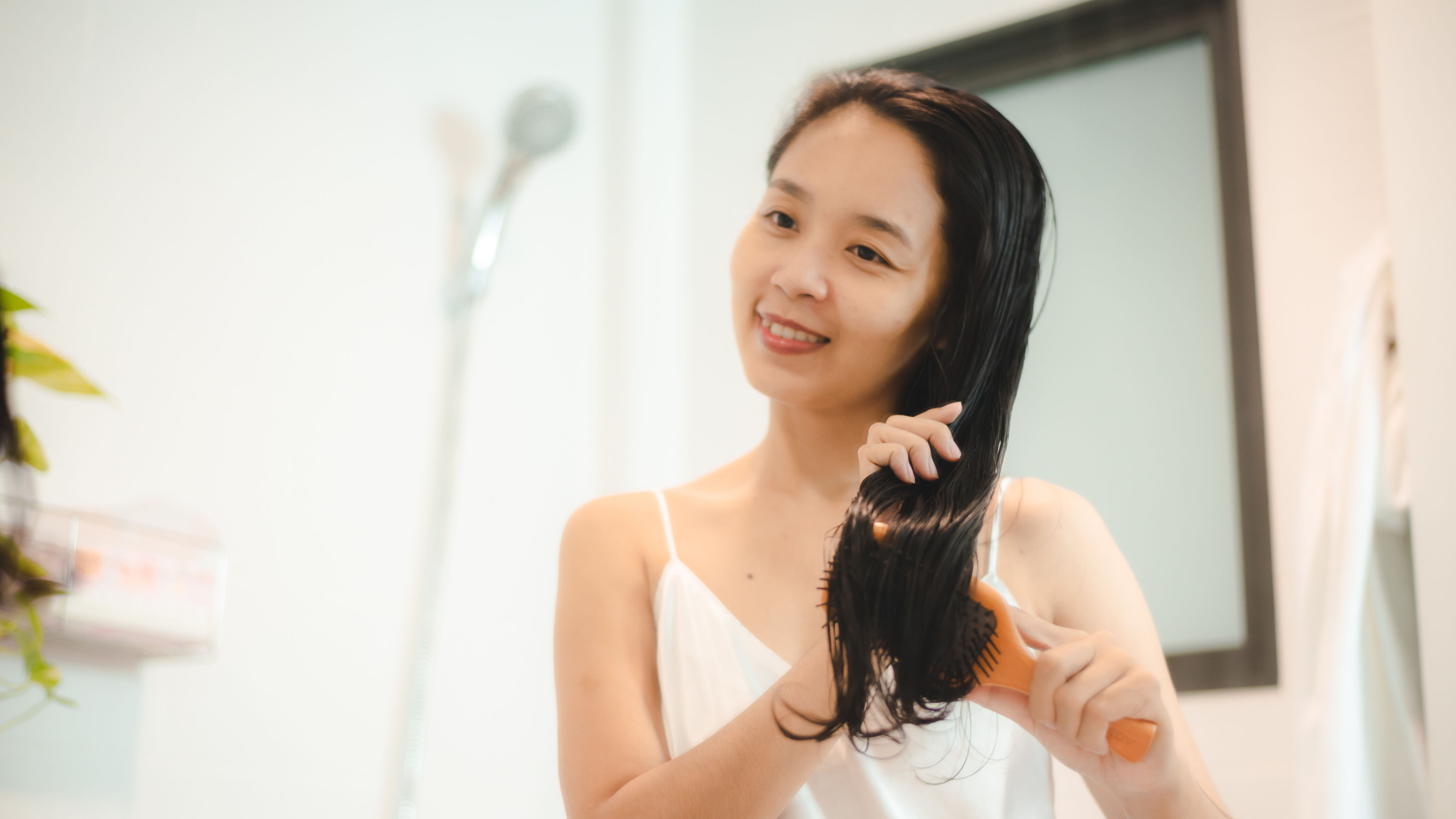 Asian female woman in beauty treatment concept, young woman hair cosmetic care. 