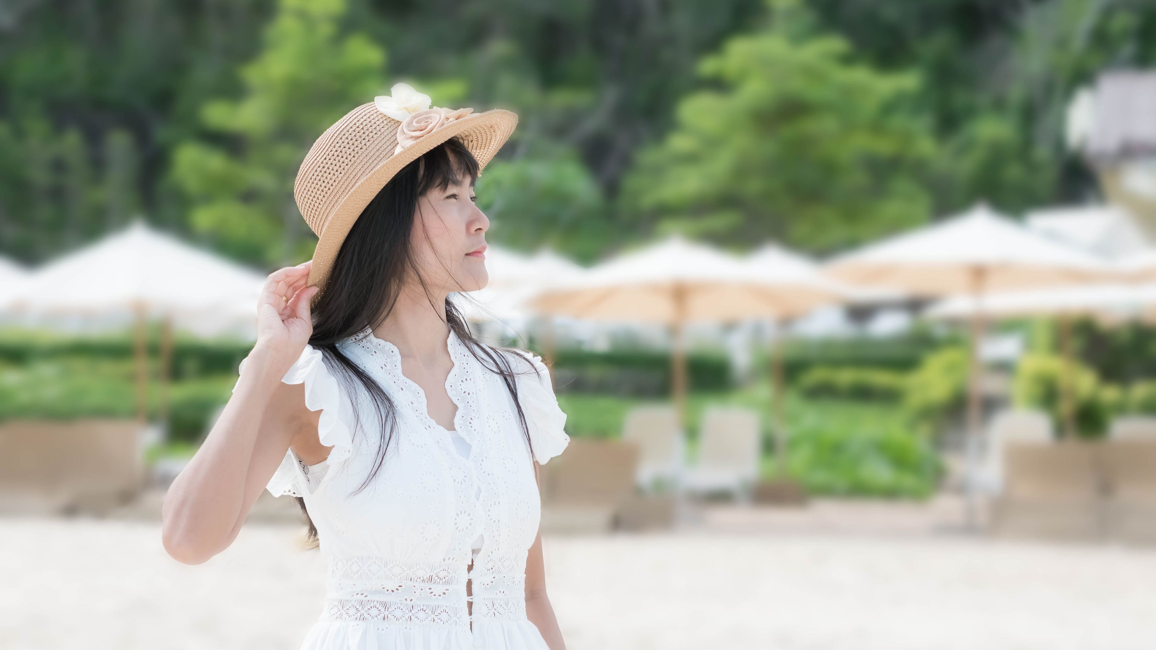 Image of an asian woman on beach 
