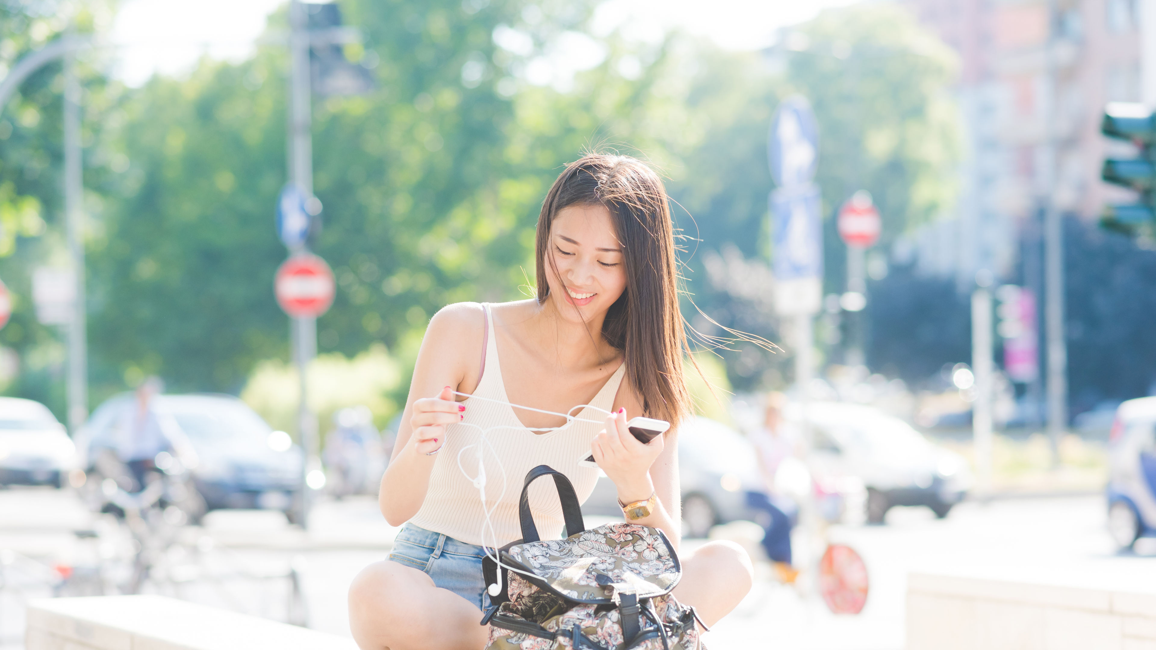 A young, beautiful Asian woman radiating elegance and natural charm