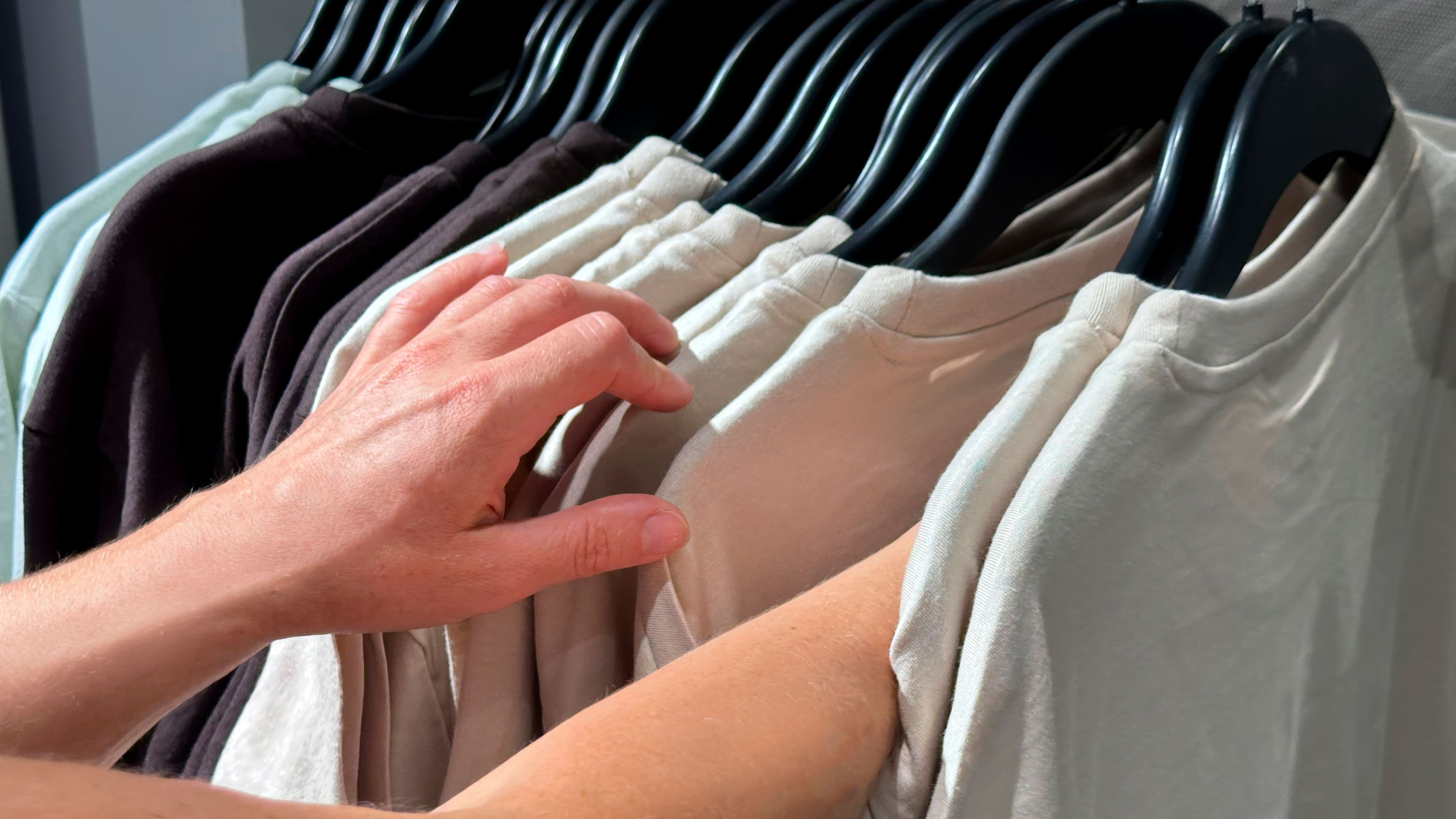 Choosing t-shirt from the wardrobe