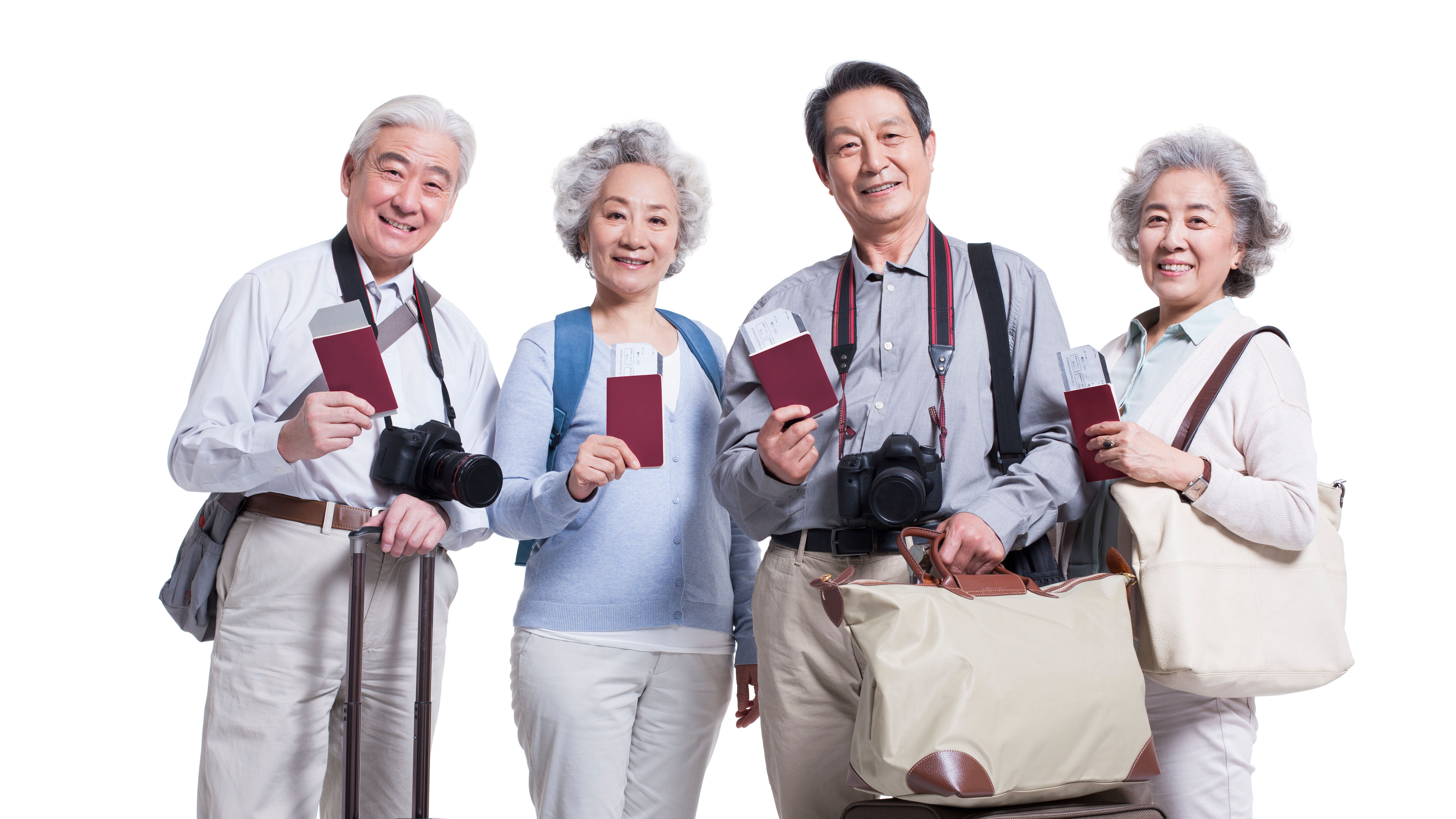 Four cheerful older adults are ready for their trip
