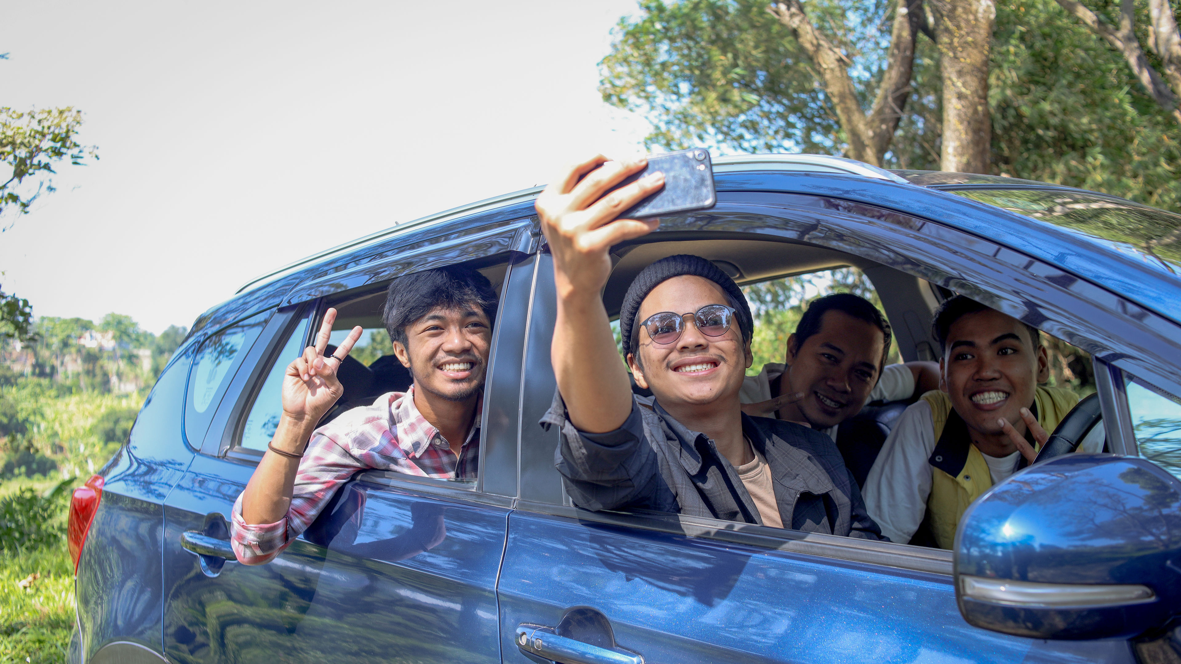 Friends sharing laughter and making memories on a fun-filled trip together. 