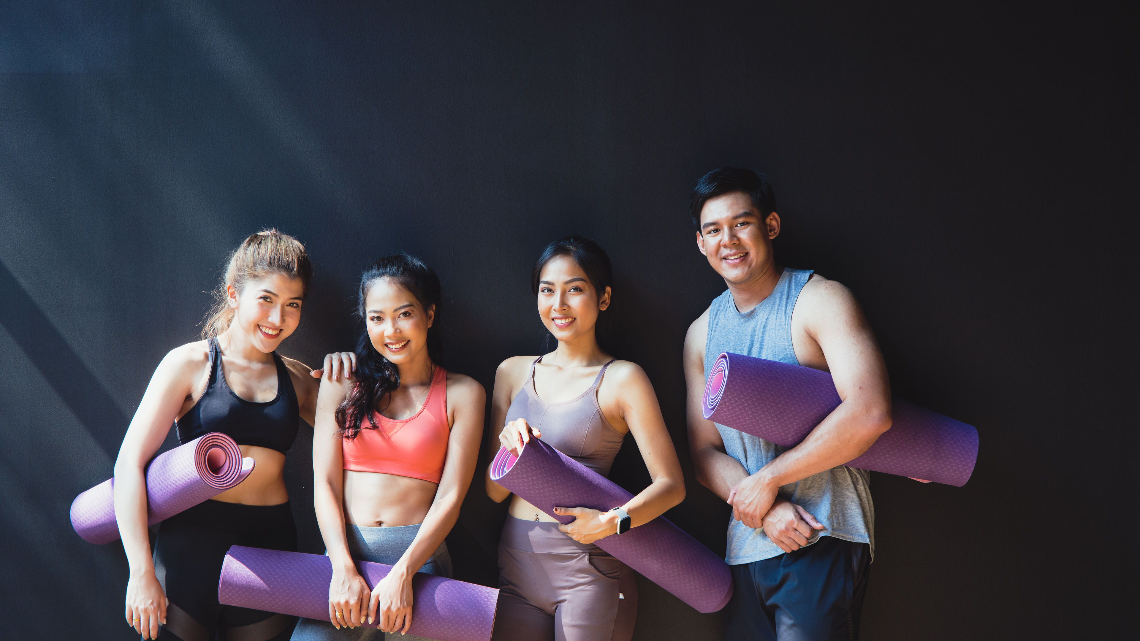 Image of Group of people with yoga mat 