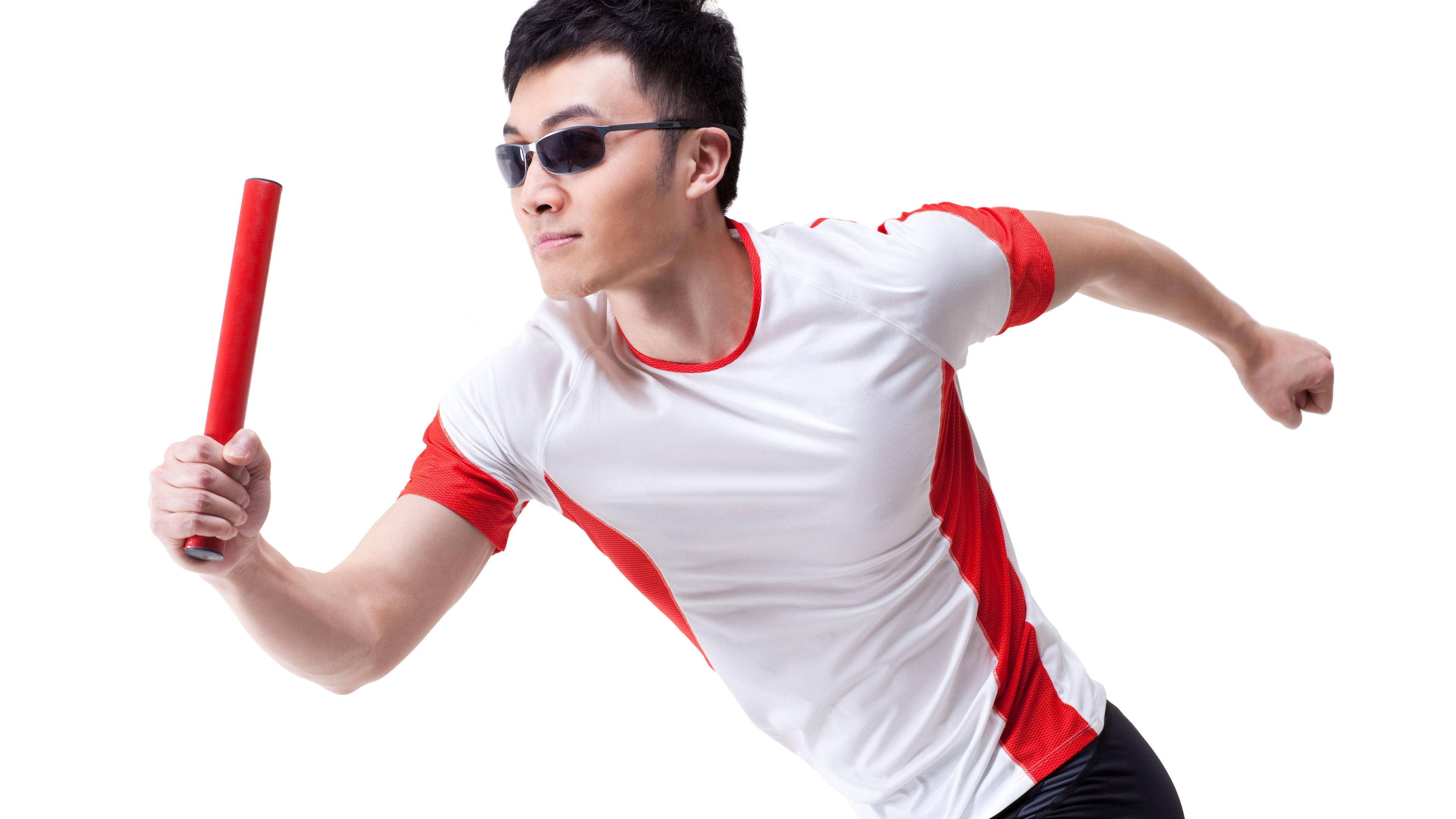 Man wearing sunglasses while running