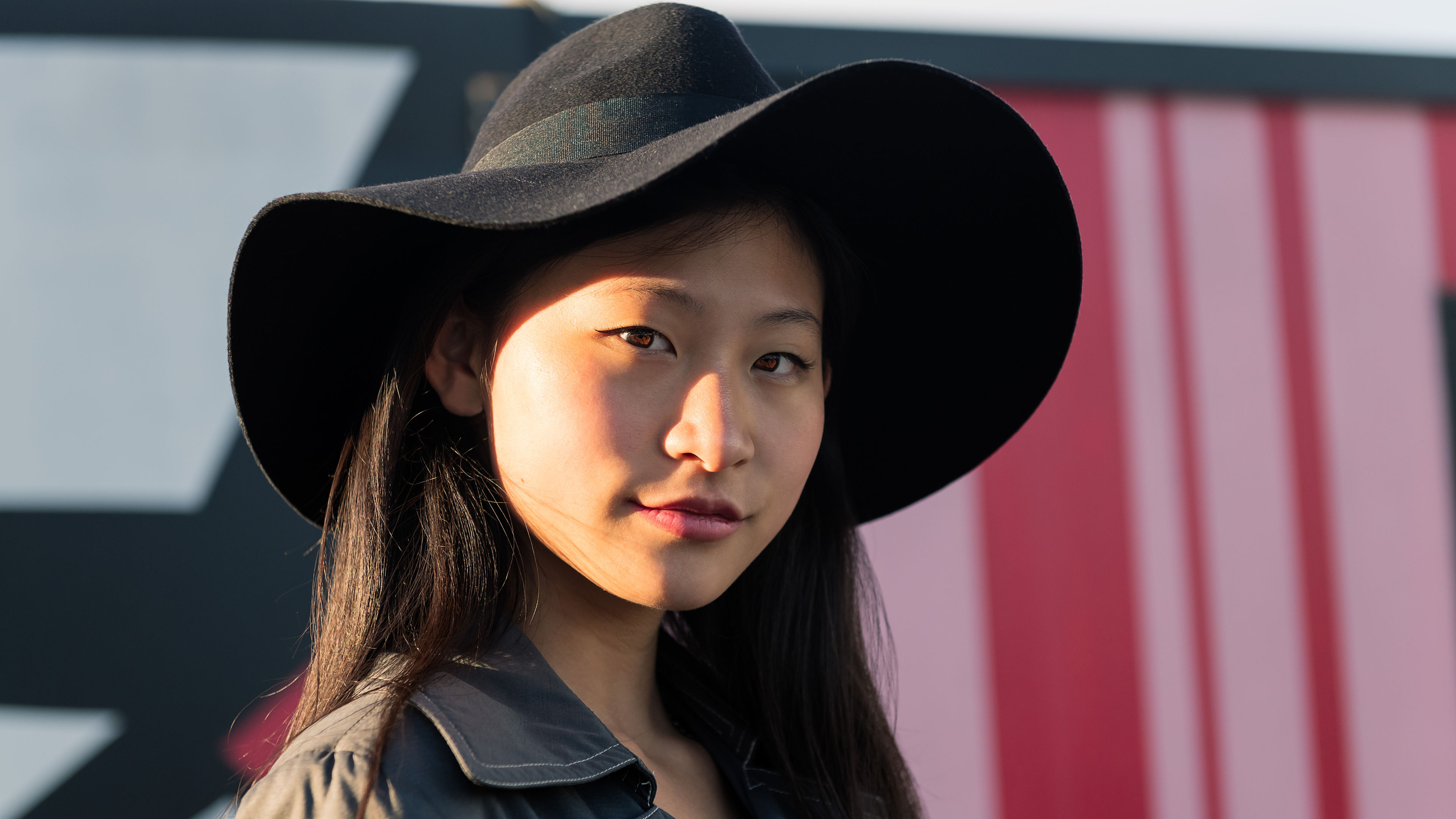 A stunning portrait of a young Asian woman radiating elegance and charm