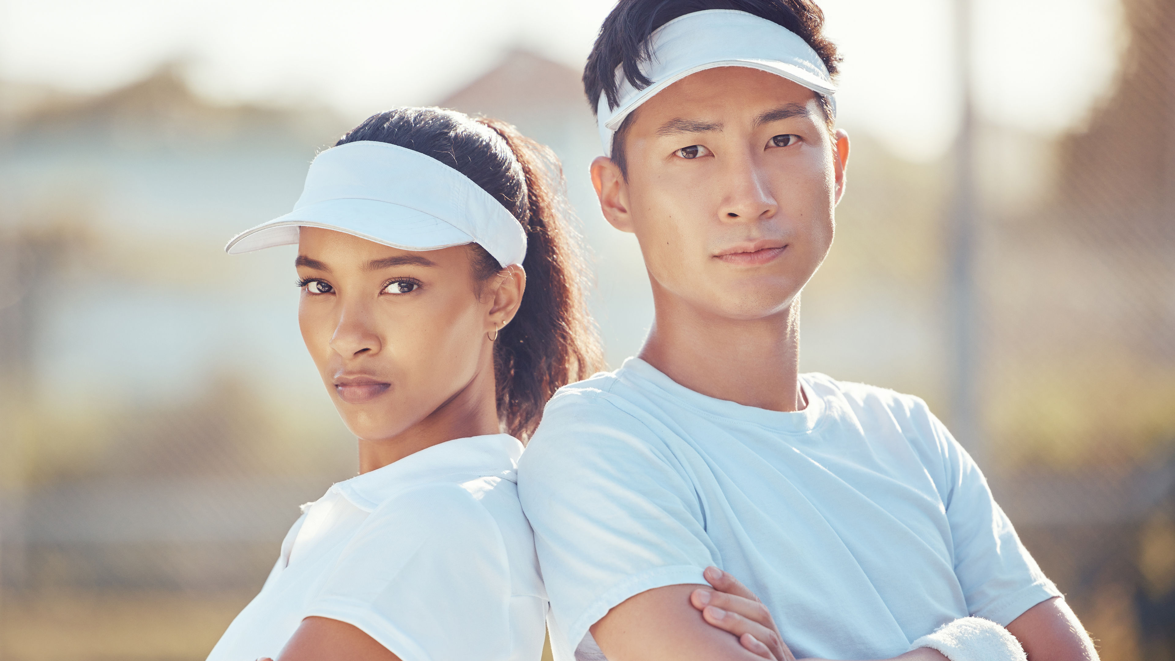 Tennis team, competitive sport and serious man and woman ready for a game or match on an outdoor 